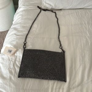 Small sparkly purse can be used as crossbody or clutch never used